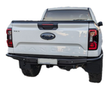 Next Gen Ranger Rear Bar with integrated high-clearance towbar and dual recovery points, featuring durable black powder coating and seamless tubular design for off-road protection and performance.