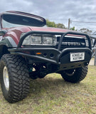 80 Series Tube Bullbar for Land Cruiser, lightweight and winch compatible, featuring customisable options and durable powder coat finish, inspired by Sam Young 4x4 builds, ideal for off-road adventures with excellent approach angle and spotlight tabs.